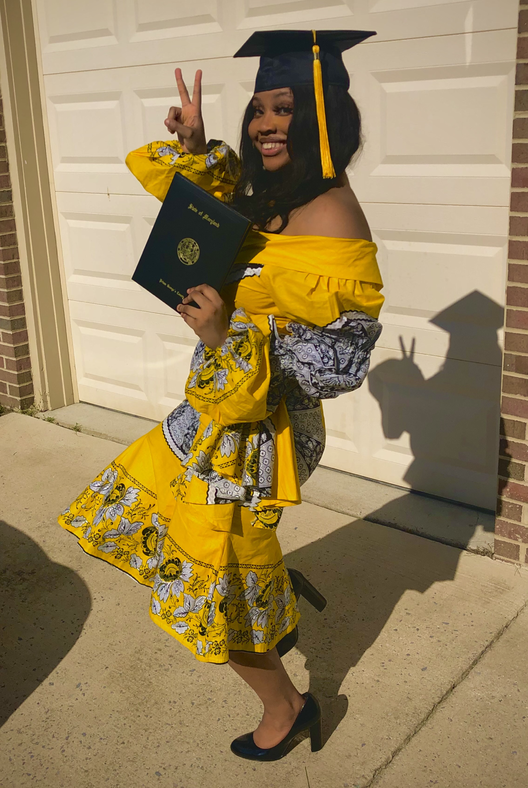 Brittany Linus graduating with her highschool diploma and associate's degree simultaneously